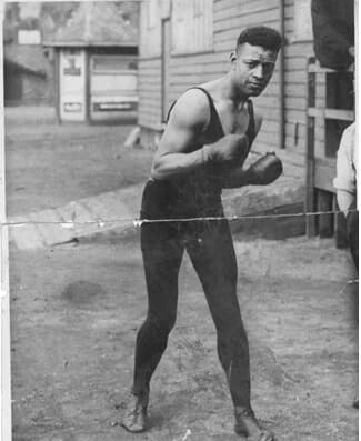 Len Johnson in a boxing stance, early in his career
